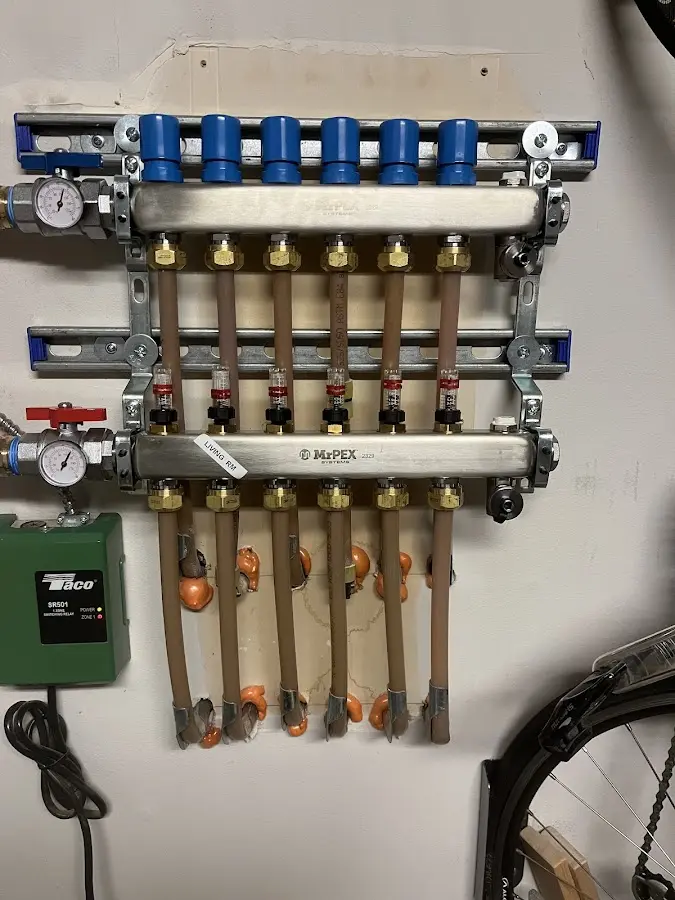 Plumber performing Water Heater Repair at a residential property in Florida Gulf Coast University